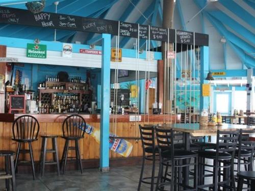 Tropical. Beach Front Resort vs. Home Sharing Rentals